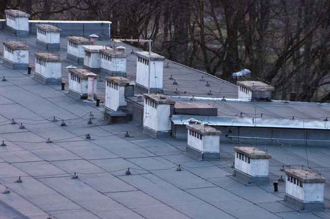 The Importance of Regular Flat Roof Inspections and Maintenance